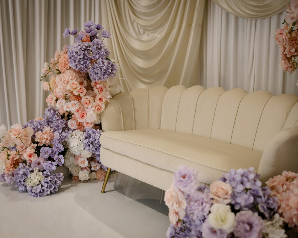 purple white orange sofa stage decor