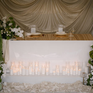 white flower with candles